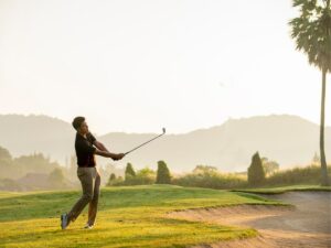 golfer playing cavity back irons